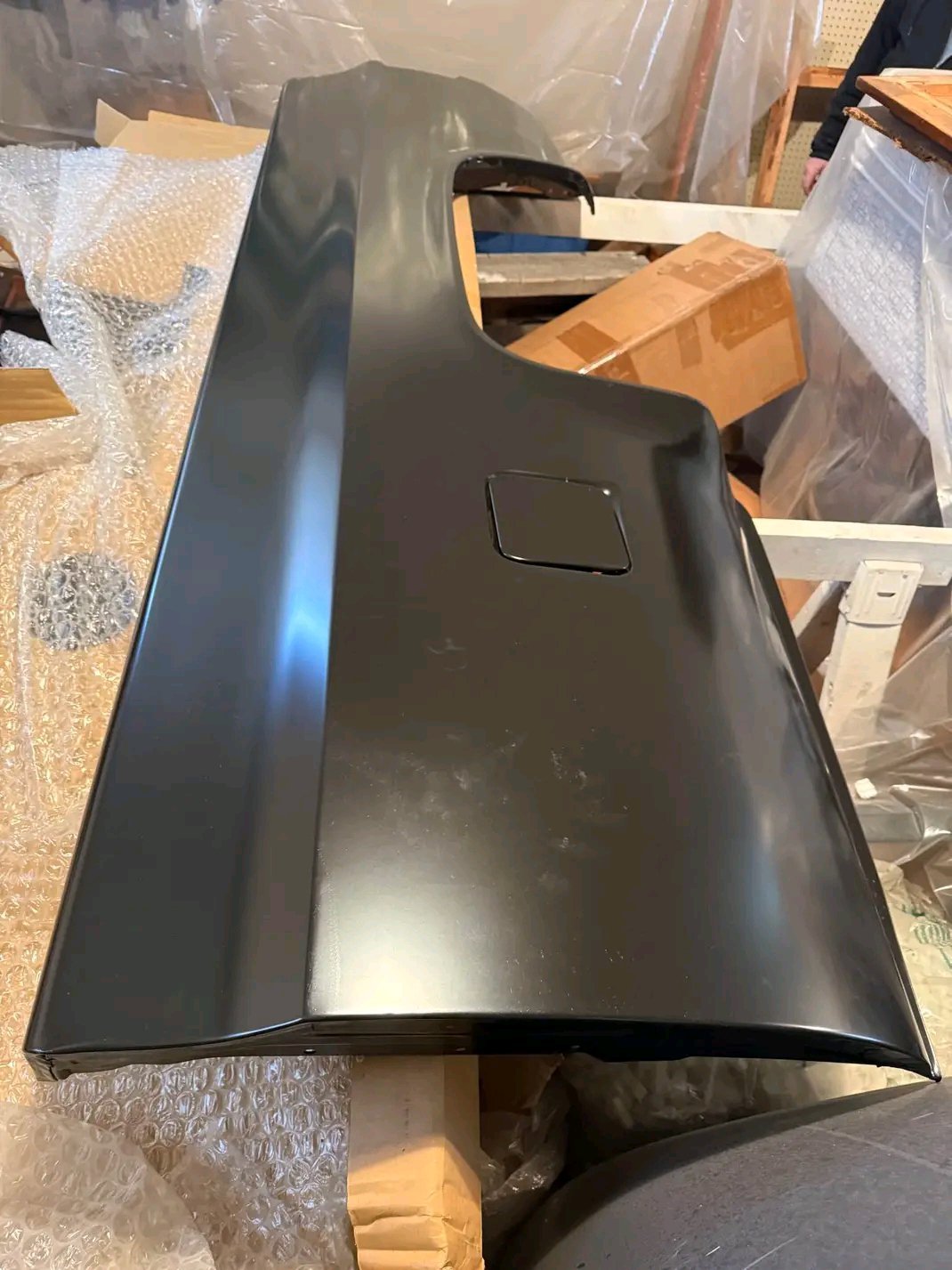 truck bedside (quarter panel).

Compatibility: Fits 1973–1987 Chevrolet C/K and GMC C/K series trucks.

Features: Includes a built-in fuel door cutout.

Finish: Coated in a black protective primer or e-coat ready for prep and paint.