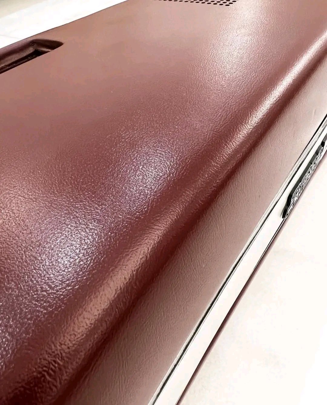 maroon or burgundy dashboard dash pad for a classic 1981–1987 Chevrolet or GMC “Squarebody” truck, featuring the Sierra Classic trim emblem.